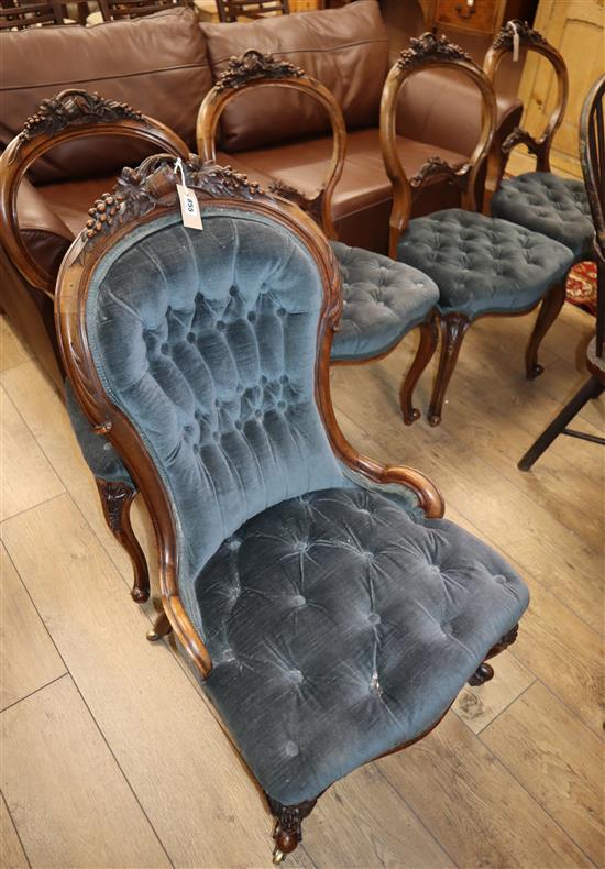 A Victorian walnut spoonback nursing chair together with four matching dining chairs